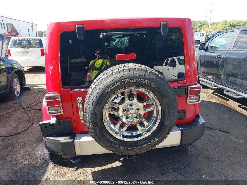 2011 Jeep Wrangler Unlimited Sahara VIN: 1J4BA5H11BL522695 Lot: 40308802