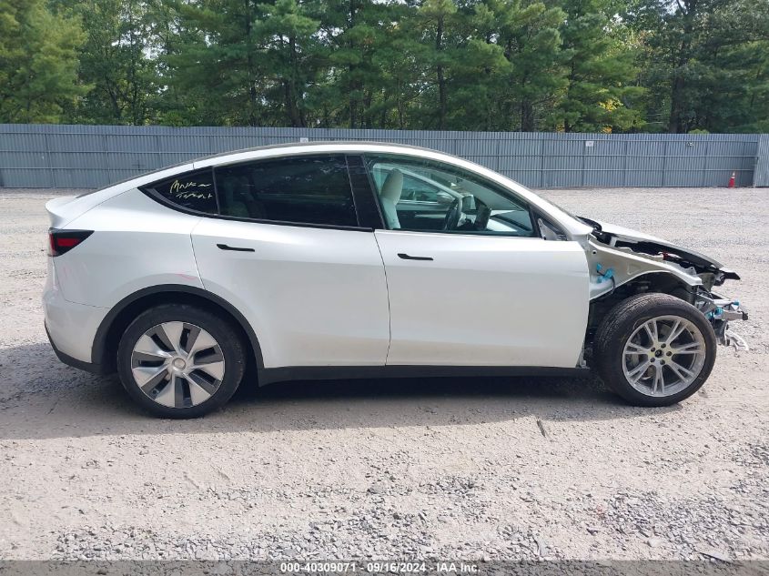 2023 Tesla Model Y Awd/Long Range Dual Motor All-Wheel Drive VIN: 7SAYGDEEXPA116246 Lot: 40309071