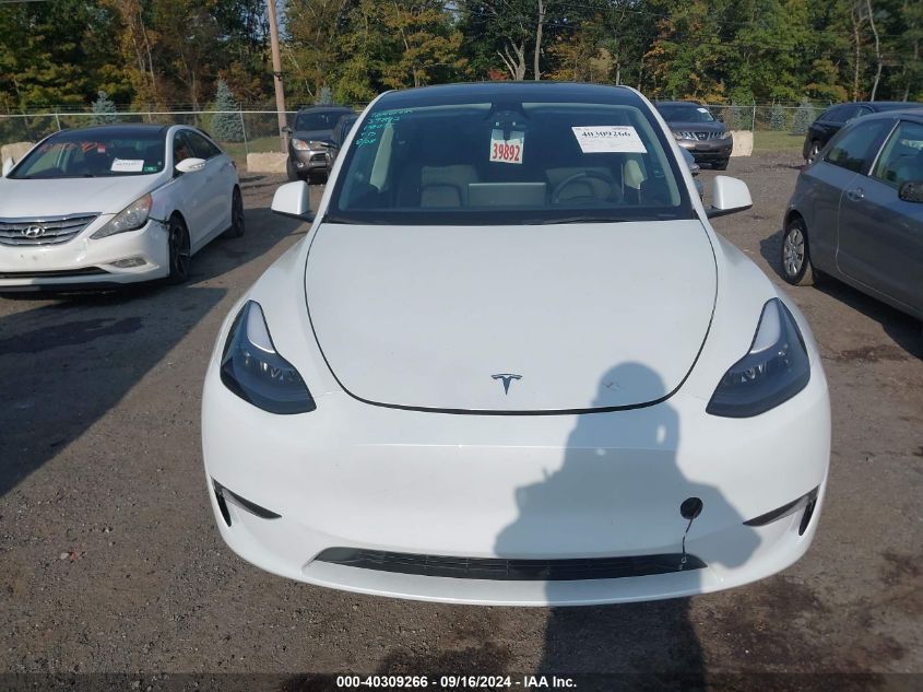 2023 Tesla Model Y Awd/Long Range Dual Motor All-Wheel Drive VIN: 7SAYGAEEXPF831514 Lot: 40309266