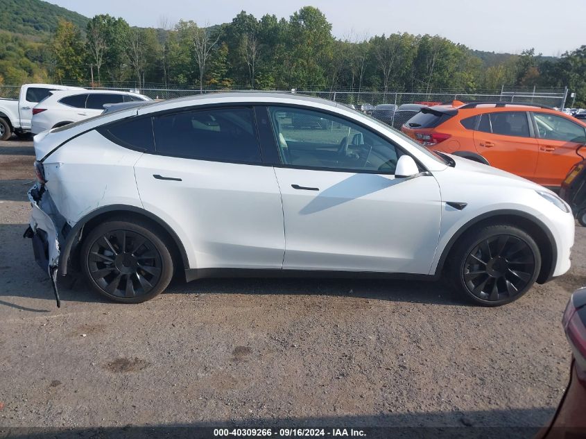 2023 Tesla Model Y Awd/Long Range Dual Motor All-Wheel Drive VIN: 7SAYGAEEXPF831514 Lot: 40309266