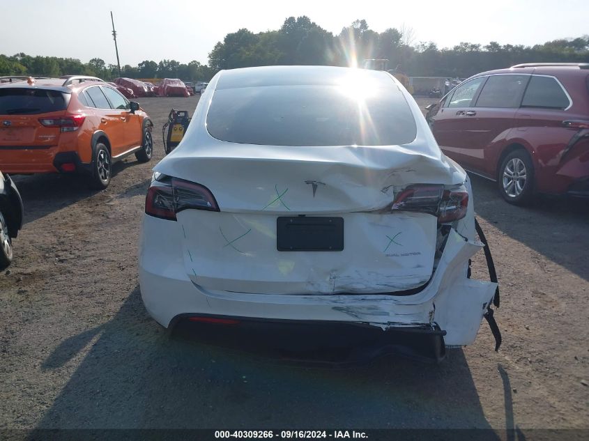 2023 Tesla Model Y Awd/Long Range Dual Motor All-Wheel Drive VIN: 7SAYGAEEXPF831514 Lot: 40309266