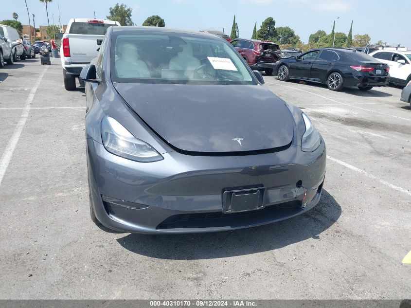 2023 Tesla Model Y VIN: 7SAYGAEE9PF641638 Lot: 40310170