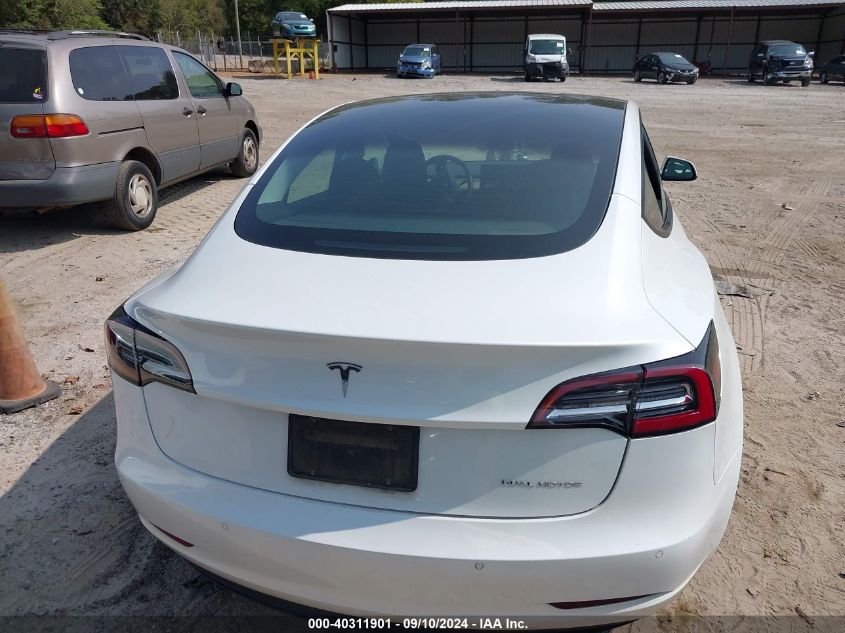 2021 Tesla Model 3 Long Range Dual Motor All-Wheel Drive VIN: 5YJ3E1EB5MF902925 Lot: 40311901