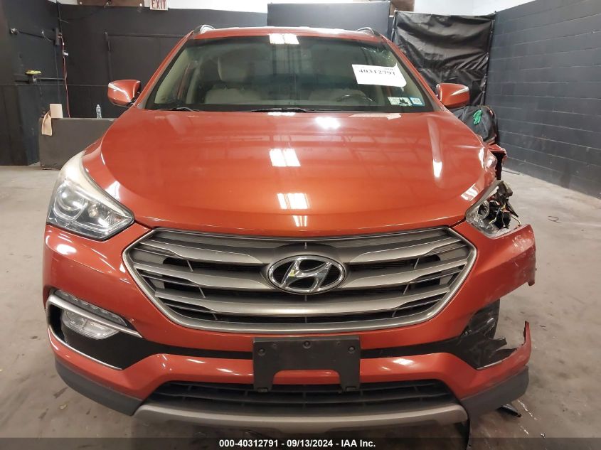 2018 Hyundai Santa Fe Sport 2.4L VIN: 5XYZUDLB1JG509106 Lot: 40312791