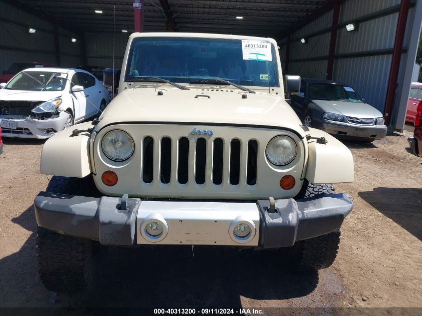 2011 Jeep Wrangler Unlimited Sahara VIN: 1J4HA5H19BL559942 Lot: 40313200