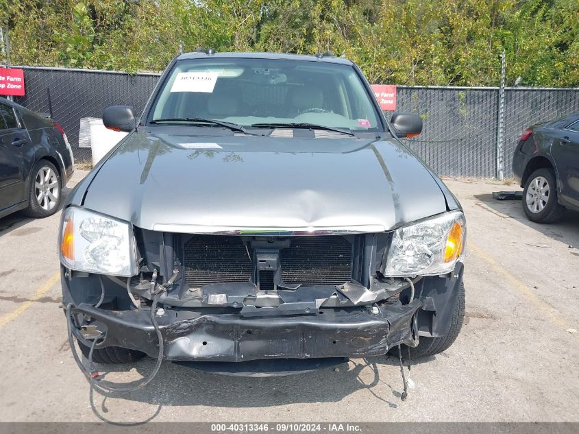 2005 GMC Envoy Slt VIN: 1GKDT13S652230945 Lot: 40313346