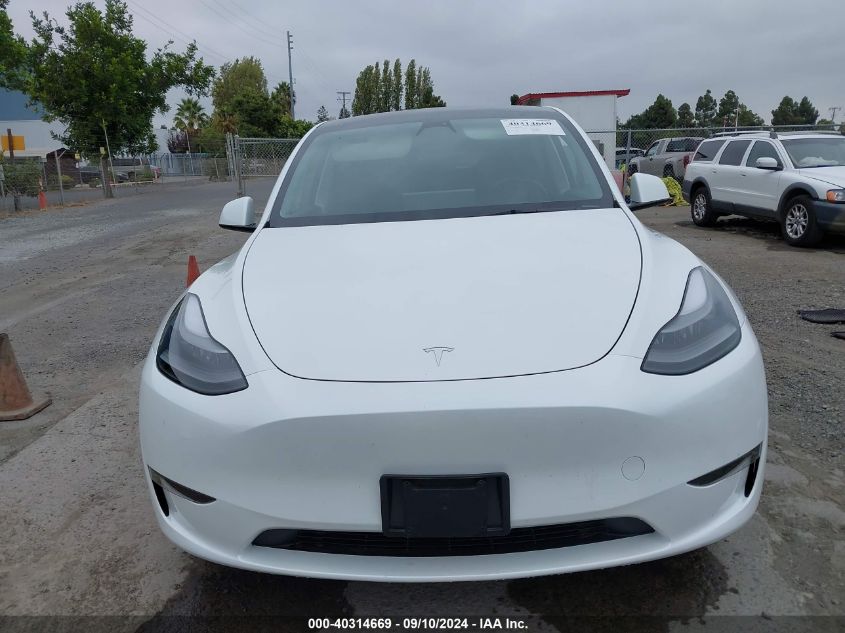 2023 Tesla Model Y VIN: 7SAYGDEE0PF749275 Lot: 40314669