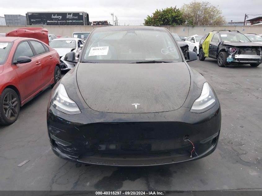 2023 Tesla Model Y Awd/Long Range Dual Motor All-Wheel Drive VIN: 7SAYGDEE8PA122661 Lot: 40315297