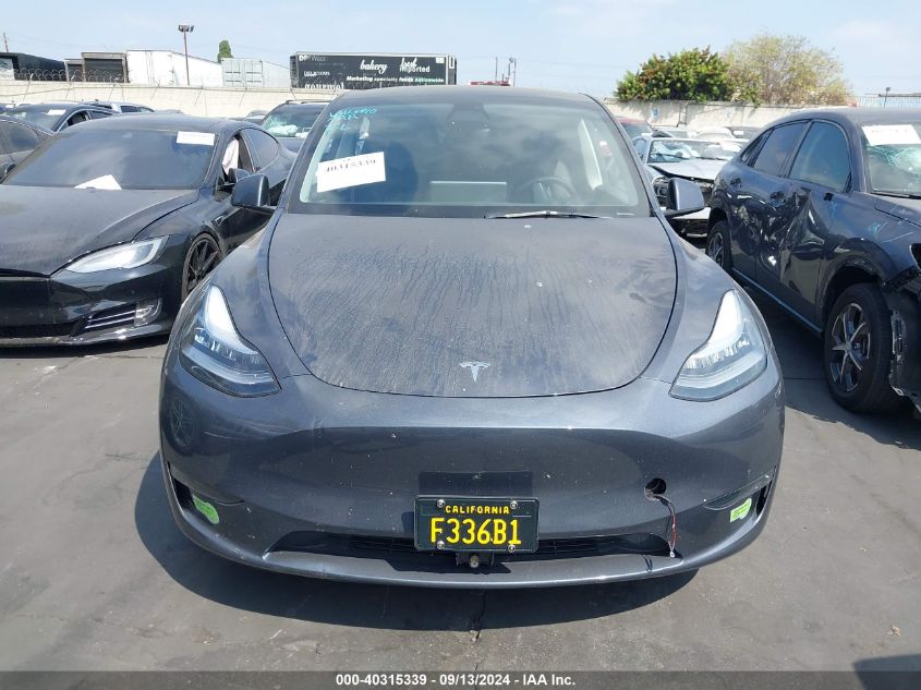 2023 Tesla Model Y Awd/Long Range Dual Motor All-Wheel Drive VIN: 7SAYGDEE1PA039525 Lot: 40315339