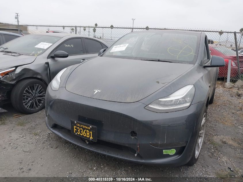 2023 Tesla Model Y Awd/Long Range Dual Motor All-Wheel Drive VIN: 7SAYGDEE1PA039525 Lot: 40315339