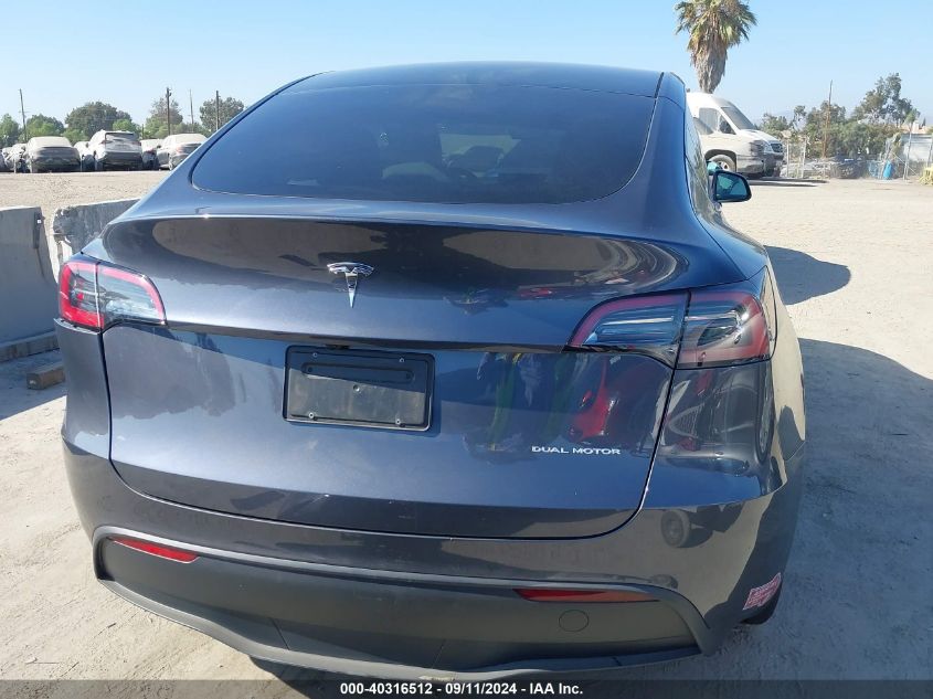 2023 Tesla Model Y Awd/Long Range Dual Motor All-Wheel Drive VIN: 7SAYGAEE2PF978359 Lot: 40316512