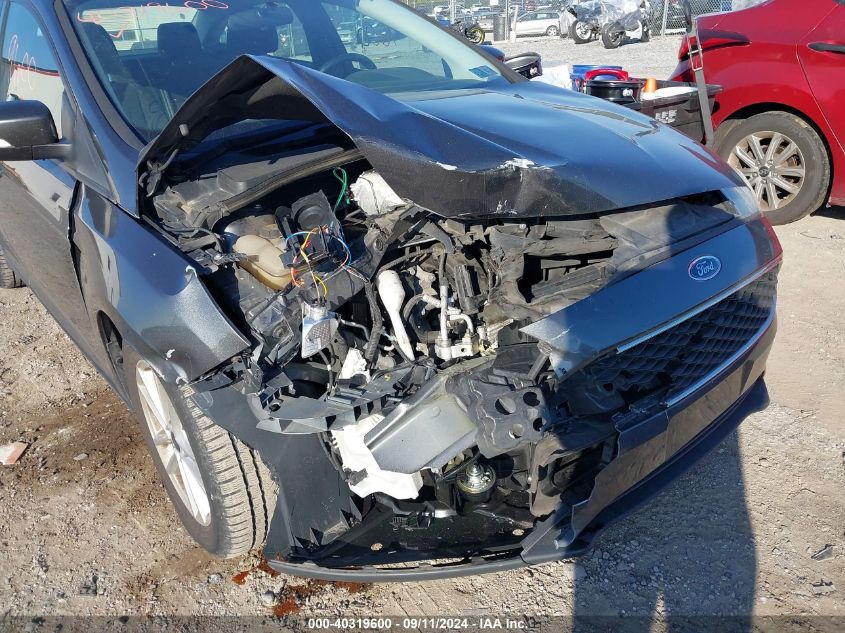 2016 Ford Focus Se VIN: 1FADP3F21GL292358 Lot: 40319600