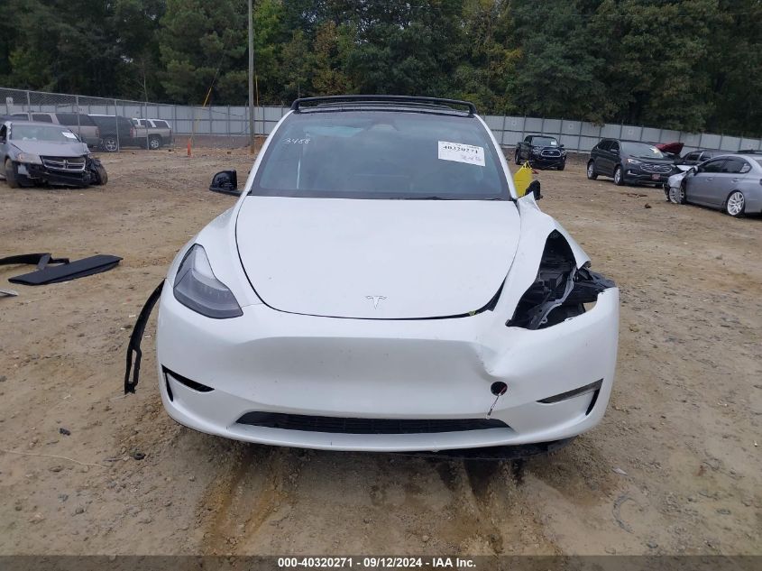 2023 Tesla Model Y VIN: 7SAYGDEF2PF803488 Lot: 40320271