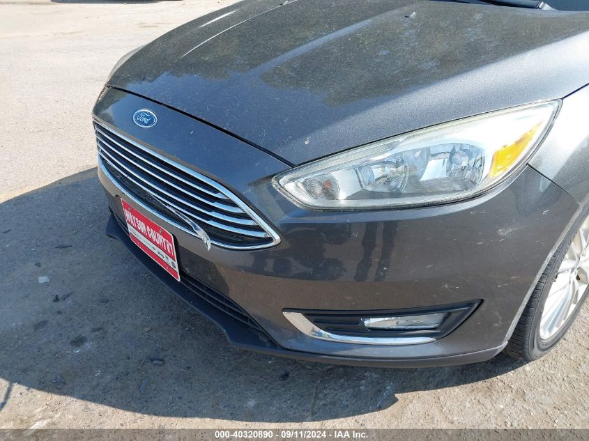 2015 Ford Focus Titanium VIN: 1FADP3N28FL230276 Lot: 40320890