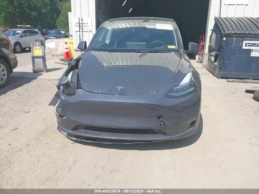 2023 Tesla Model Y VIN: 7SAYGDEE1PA123702 Lot: 40322674