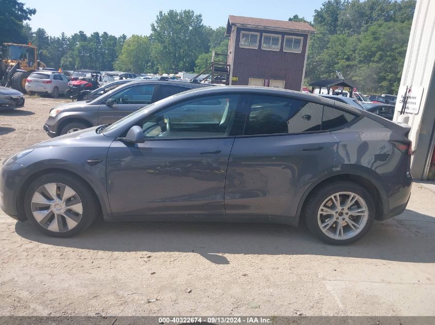 2023 Tesla Model Y VIN: 7SAYGDEE1PA123702 Lot: 40322674