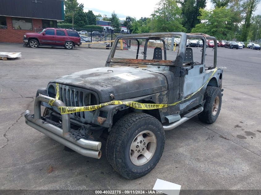 2000 Jeep Wrangler Sport VIN: 1J4FA49S5YP797345 Lot: 40322775