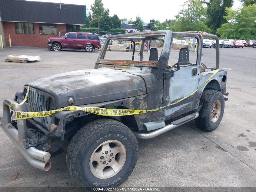 2000 Jeep Wrangler Sport VIN: 1J4FA49S5YP797345 Lot: 40322775