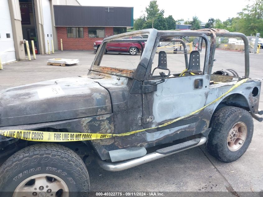 2000 Jeep Wrangler Sport VIN: 1J4FA49S5YP797345 Lot: 40322775