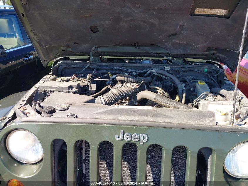 2009 Jeep Wrangler Sahara VIN: 1J4FA54139L744043 Lot: 40324313