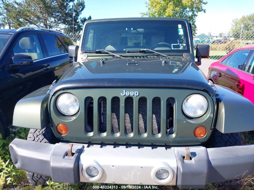 2009 Jeep Wrangler Sahara VIN: 1J4FA54139L744043 Lot: 40324313
