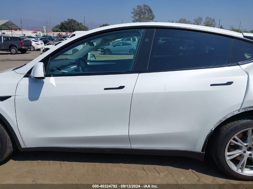 2023 Tesla Model Y Awd/Long Range Dual Motor All-Wheel Drive VIN: 7SAYGAEE0PF794358 Lot: 40324792