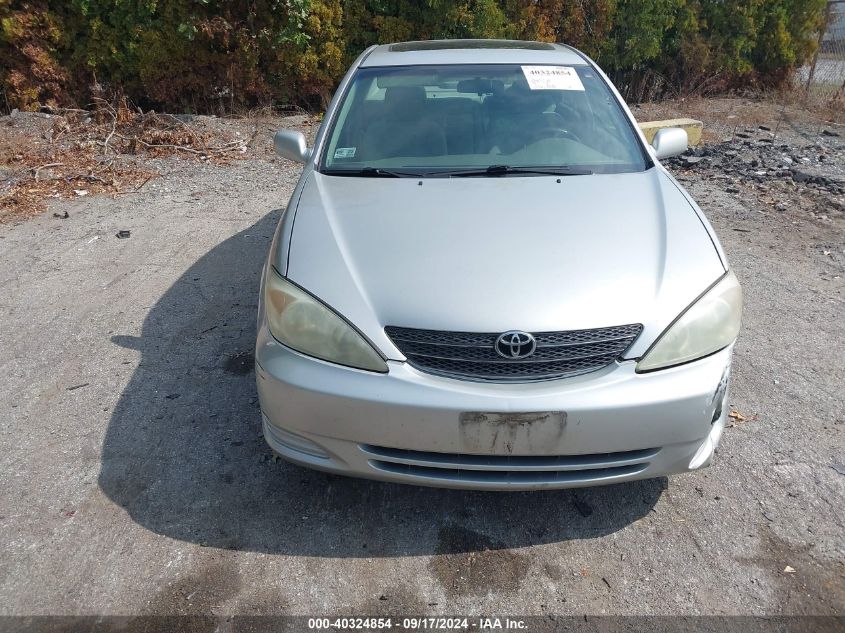 2004 Toyota Camry Le V6 VIN: 4T1BF32K94U570726 Lot: 40324854