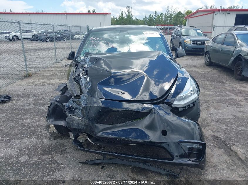 2023 Tesla Model Y Awd/Long Range Dual Motor All-Wheel Drive VIN: 7SAYGDEE7PA055390 Lot: 40326672