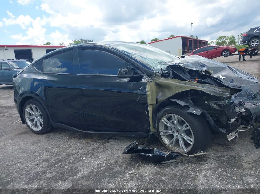 2023 Tesla Model Y Awd/Long Range Dual Motor All-Wheel Drive VIN: 7SAYGDEE7PA055390 Lot: 40326672