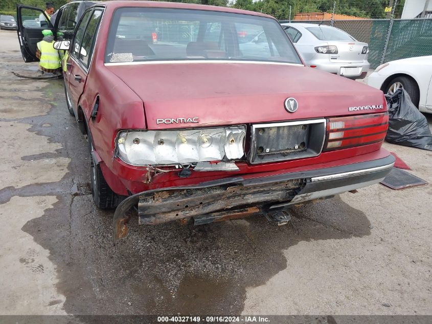 1989 Pontiac Bonneville Le VIN: 1G2HX54CXKW210335 Lot: 40327149