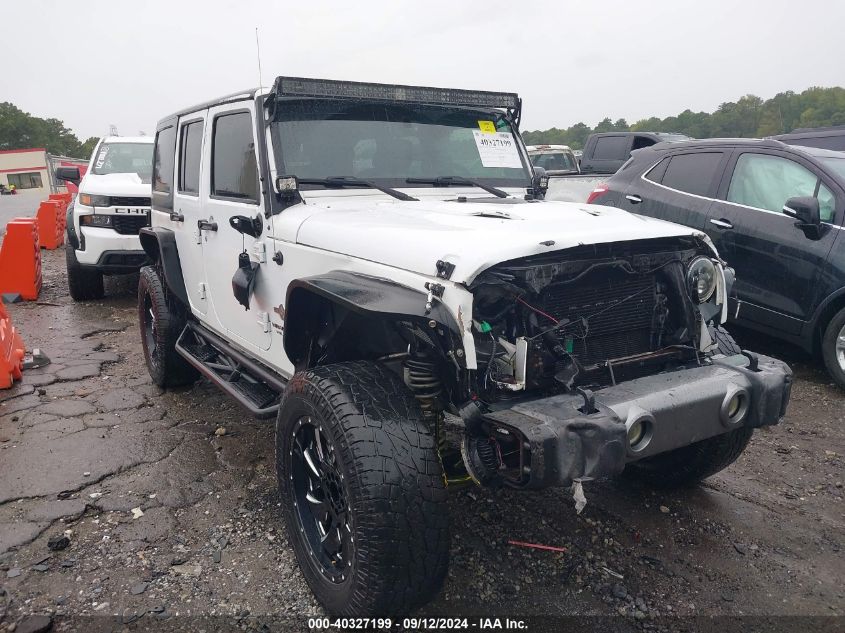 2015 Jeep Wrangler Unlimited Freedom Edition VIN: 1C4BJWDG6FL563500 Lot: 40327199