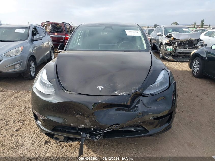 2024 Tesla Model Y Long Range Dual Motor All-Wheel Drive VIN: 7SAYGAEE6RF150348 Lot: 40328931