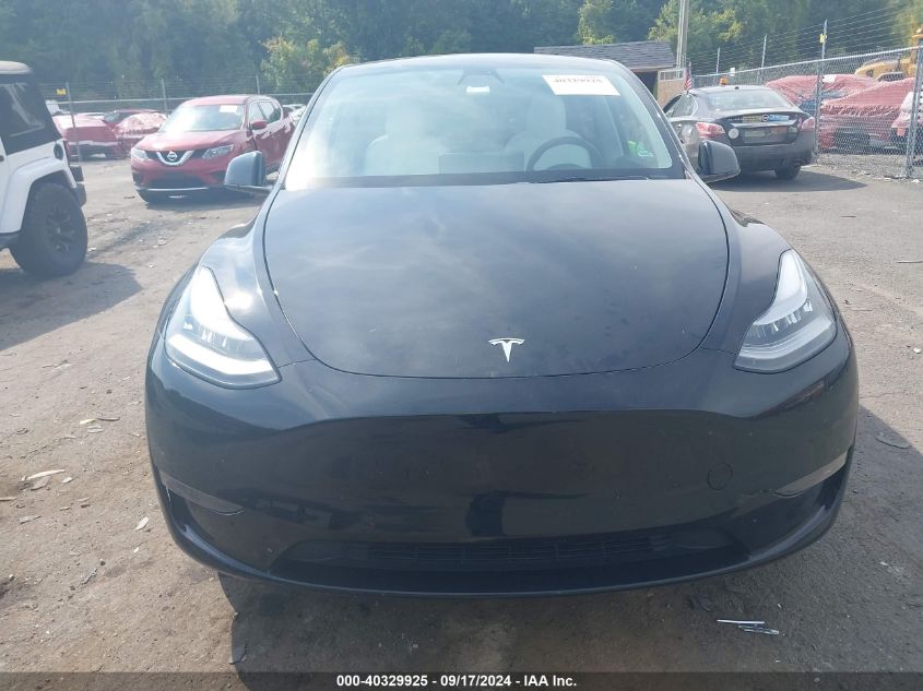 2021 Tesla Model Y Standard Range Rear-Wheel Drive VIN: 5YJYGDED5MF110342 Lot: 40329925