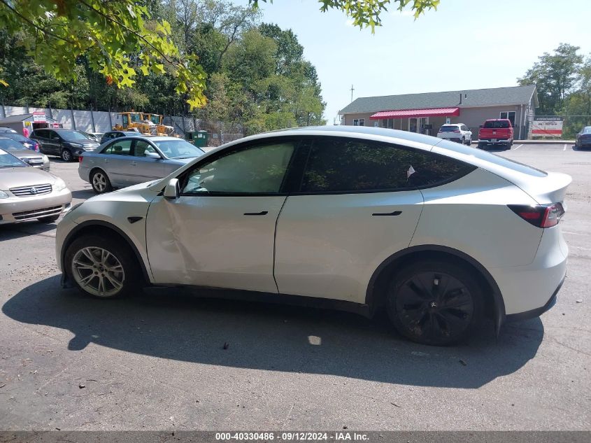 2023 Tesla Model Y Awd/Long Range Dual Motor All-Wheel Drive VIN: 7SAYGDEE3PF686124 Lot: 40330486