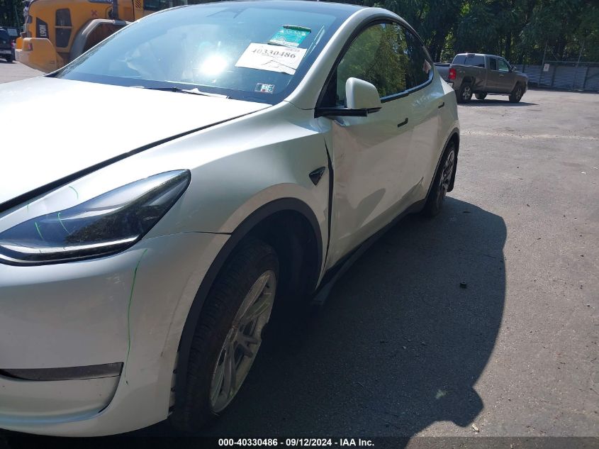 2023 Tesla Model Y Awd/Long Range Dual Motor All-Wheel Drive VIN: 7SAYGDEE3PF686124 Lot: 40330486