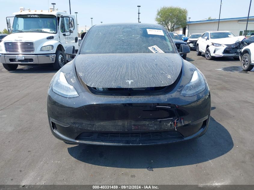 2023 Tesla Model Y VIN: 7SAYGDED6PF964277 Lot: 40331459