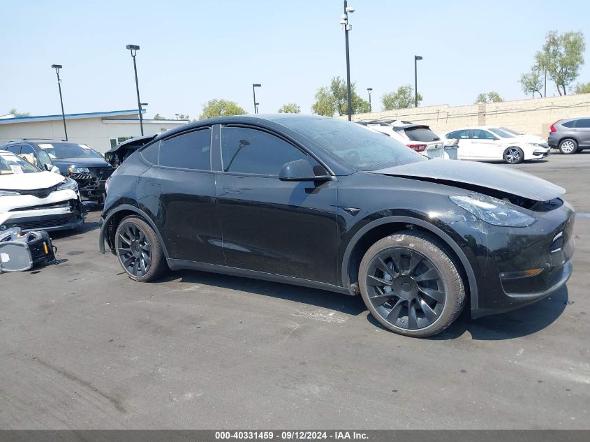 2023 Tesla Model Y VIN: 7SAYGDED6PF964277 Lot: 40331459