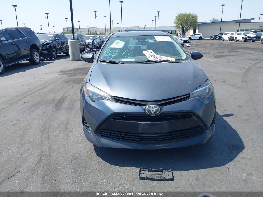 2017 Toyota Corolla Le VIN: 5YFBURHE5HP690864 Lot: 40334446