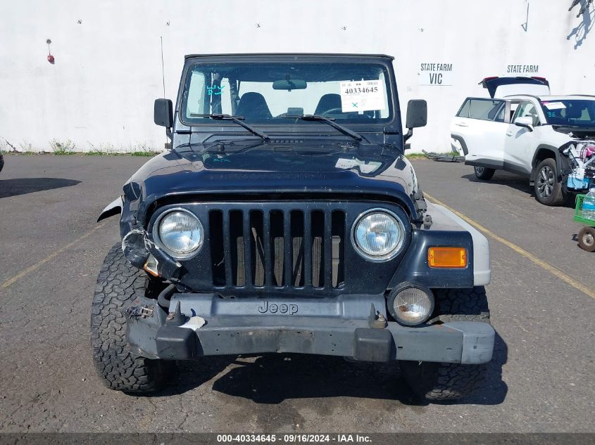 2002 Jeep Wrangler Sport VIN: 1J4FA49S22P708693 Lot: 40334645