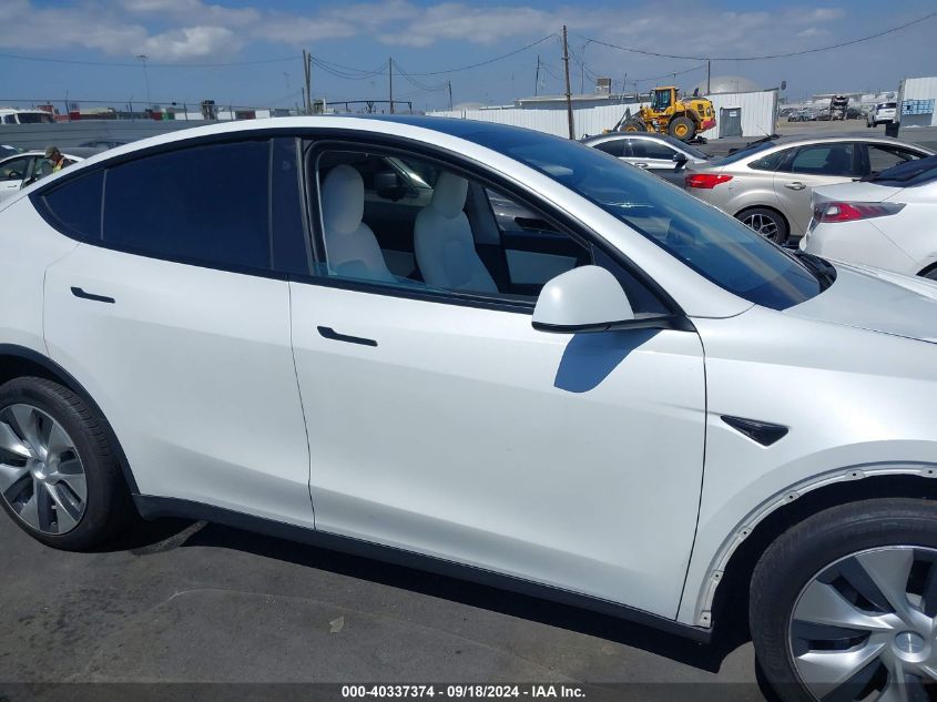 2021 Tesla Model Y Standard Range Rear-Wheel Drive VIN: 5YJYGDED0MF163207 Lot: 40337374