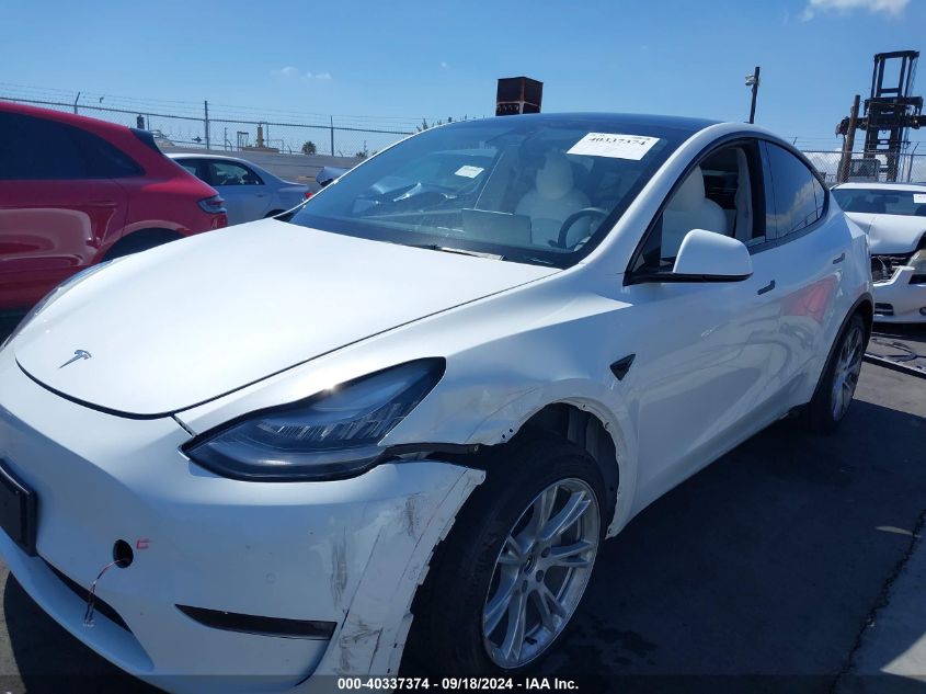 2021 Tesla Model Y Standard Range Rear-Wheel Drive VIN: 5YJYGDED0MF163207 Lot: 40337374