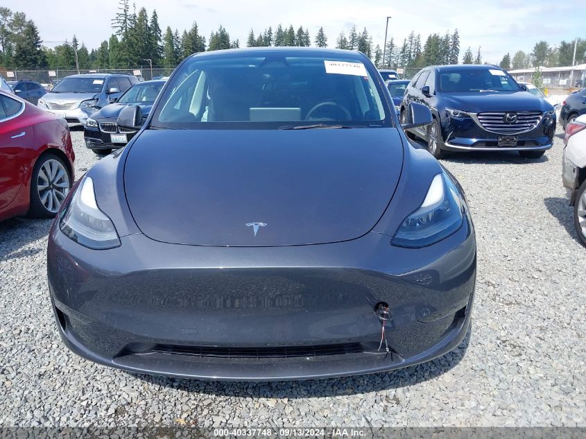 2023 Tesla Model Y Awd/Long Range Dual Motor All-Wheel Drive VIN: 7SAYGDEE2PF858644 Lot: 40337748