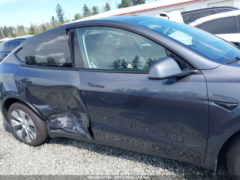 2023 Tesla Model Y Awd/Long Range Dual Motor All-Wheel Drive VIN: 7SAYGDEE2PF858644 Lot: 40337748