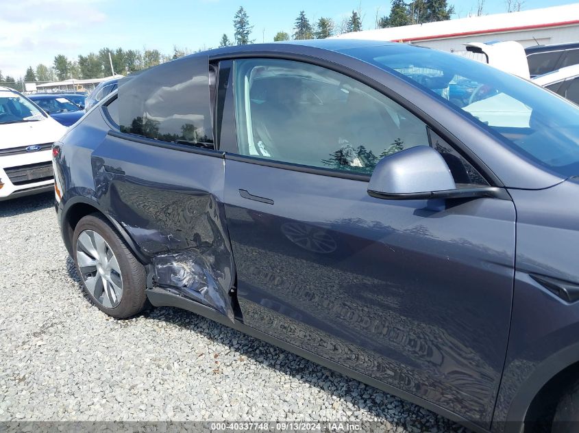 2023 Tesla Model Y Awd/Long Range Dual Motor All-Wheel Drive VIN: 7SAYGDEE2PF858644 Lot: 40337748