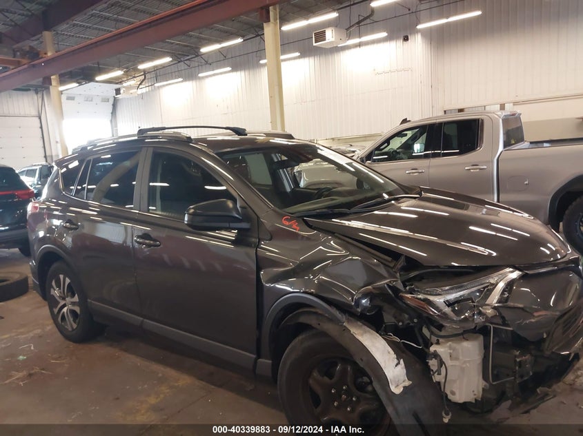 JTMBFREV6HJ131889 2017 Toyota Rav4 Le