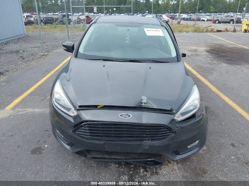 2016 Ford Focus Se VIN: 1FADP3FE9GL355118 Lot: 40339959