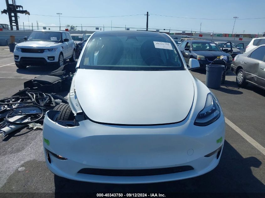 2023 Tesla Model Y Awd/Long Range Dual Motor All-Wheel Drive VIN: 7SAYGDEE3PA104780 Lot: 40343750