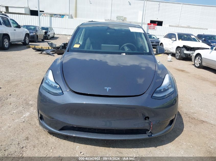 2023 Tesla Model Y Awd/Long Range Dual Motor All-Wheel Drive VIN: 7SAYGDEEXPA042147 Lot: 40343902