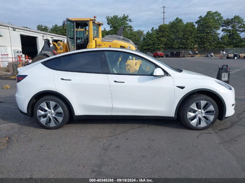 2023 Tesla Model Y Awd/Long Range Dual Motor All-Wheel Drive VIN: 7SAYGDEE2PA086305 Lot: 40345285