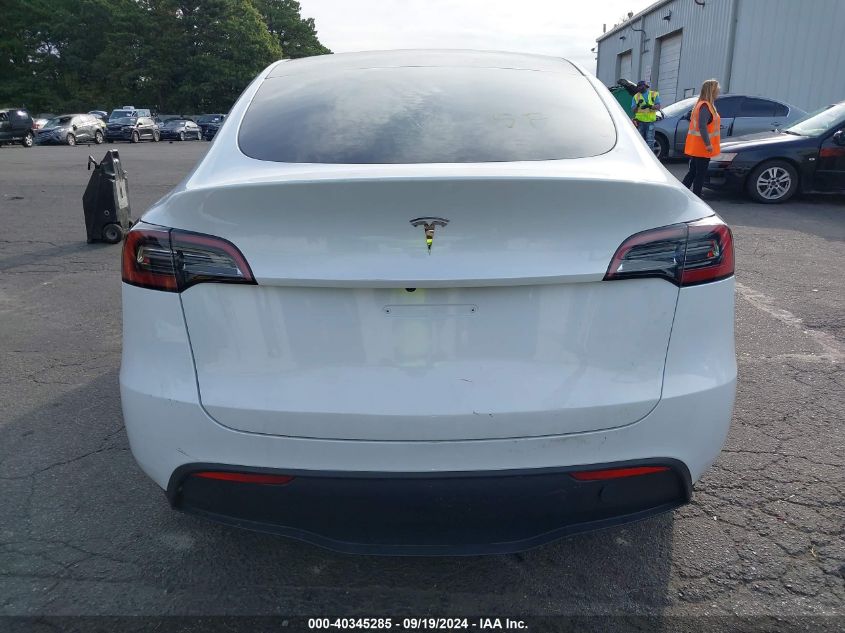 2023 Tesla Model Y Awd/Long Range Dual Motor All-Wheel Drive VIN: 7SAYGDEE2PA086305 Lot: 40345285